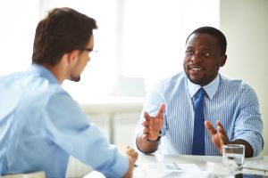Businessmen talking 1 on 1 coaching